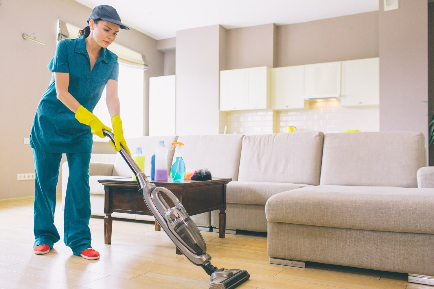 girl-is-walking-studio-apartment-cleaning-floor-with-vacuum-cleaner-she-holds-it-with-both-hands-woman-is-alone_152404-8720-transformed